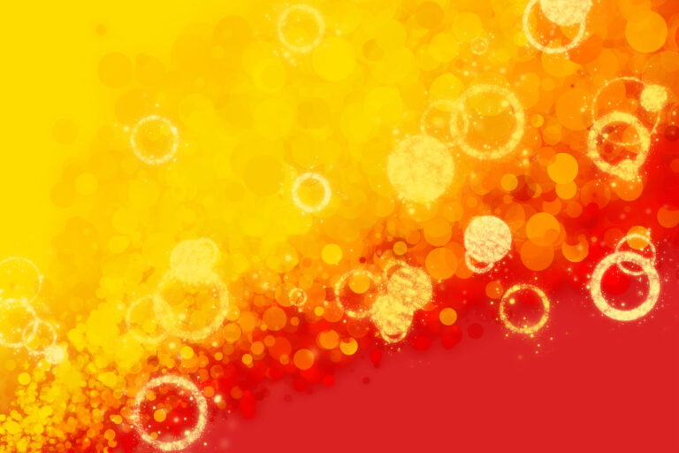 Red and yellow gradient background with decorative bubbles and rings