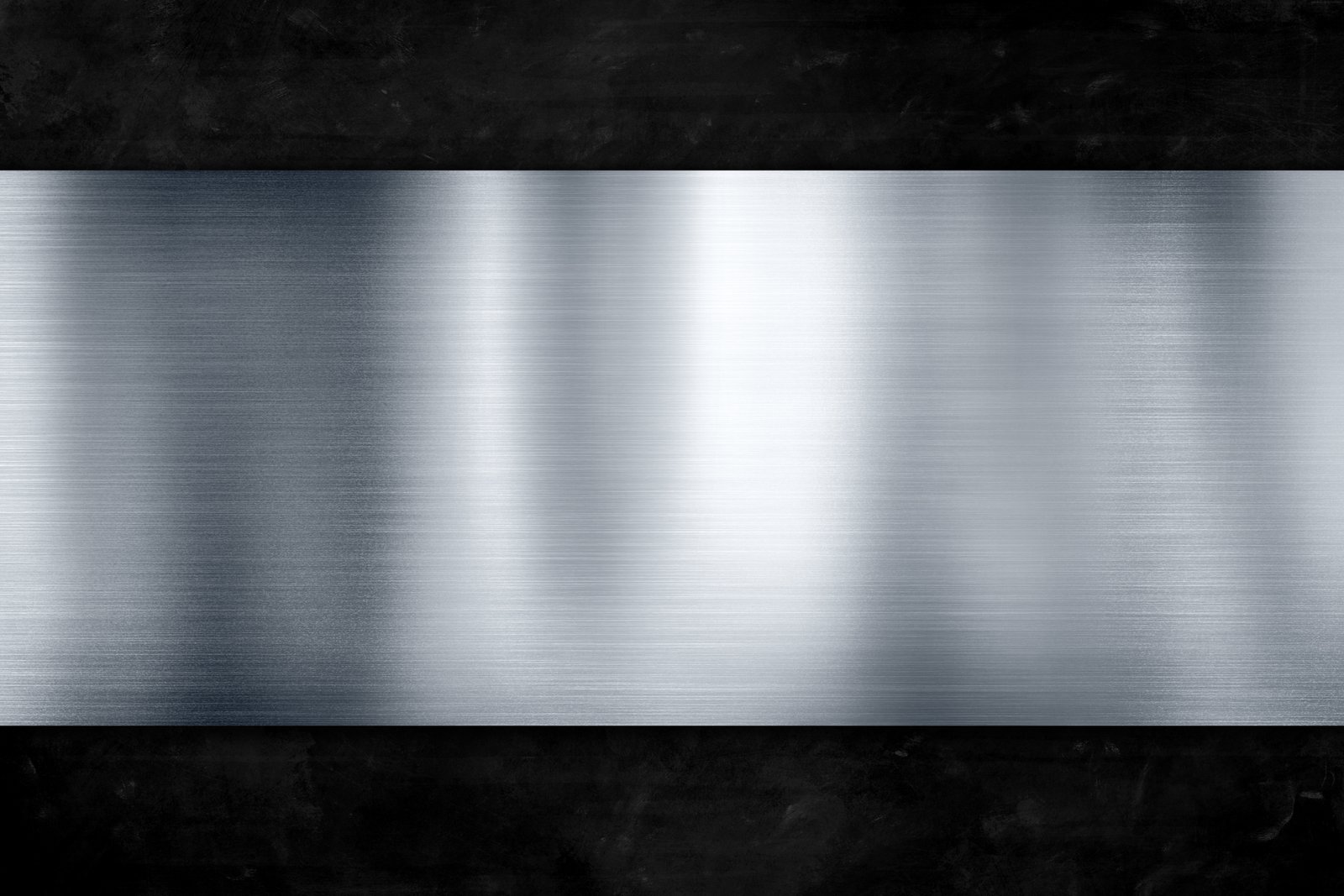 Silver metal plate with a black background